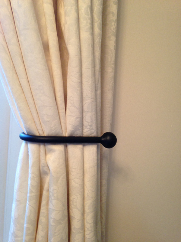  A Pair of Black Wrought Iron Tie Backs with Ball Ends